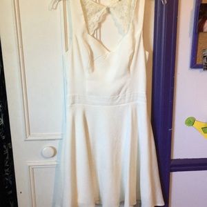 White lacy open back sleeveless dress